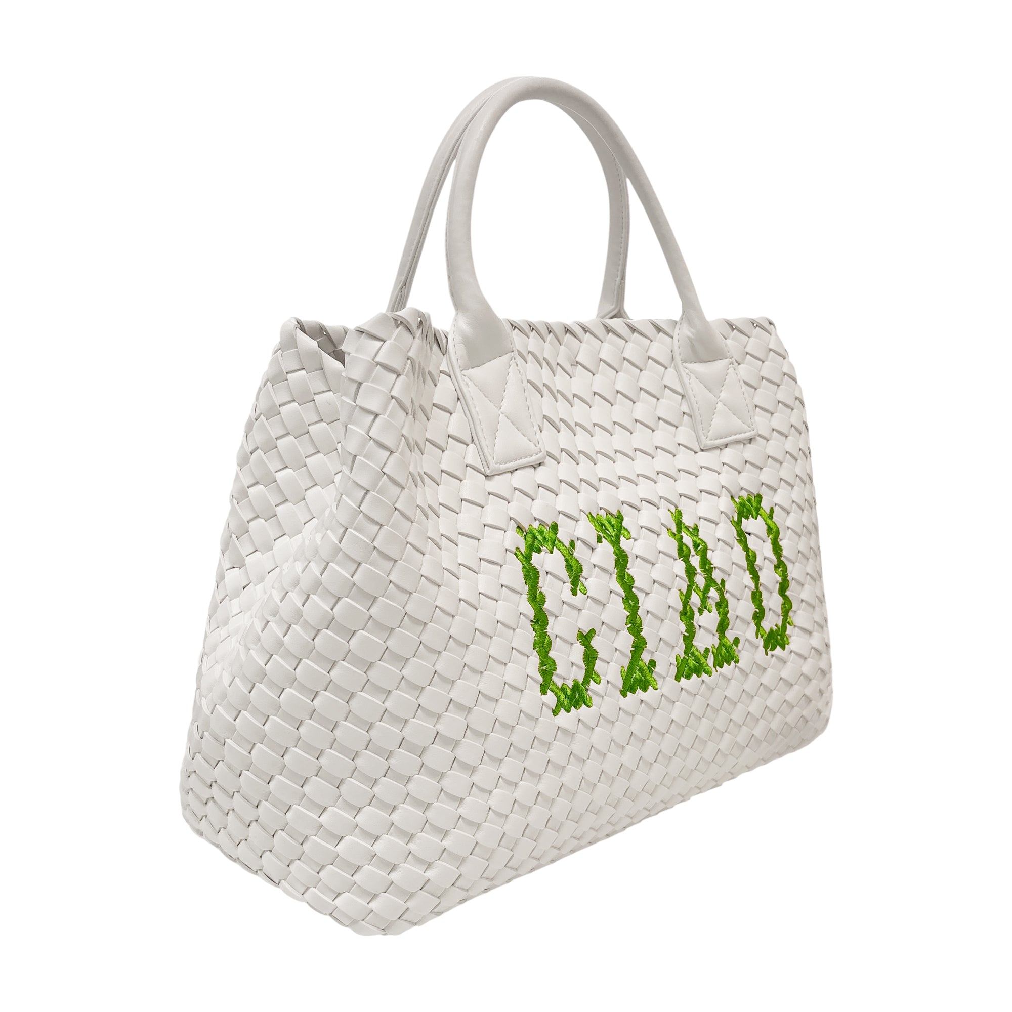 Green Lilly Loves Ciao vegan handbag with white accents, showcasing a stylish design and durable handles for everyday use.