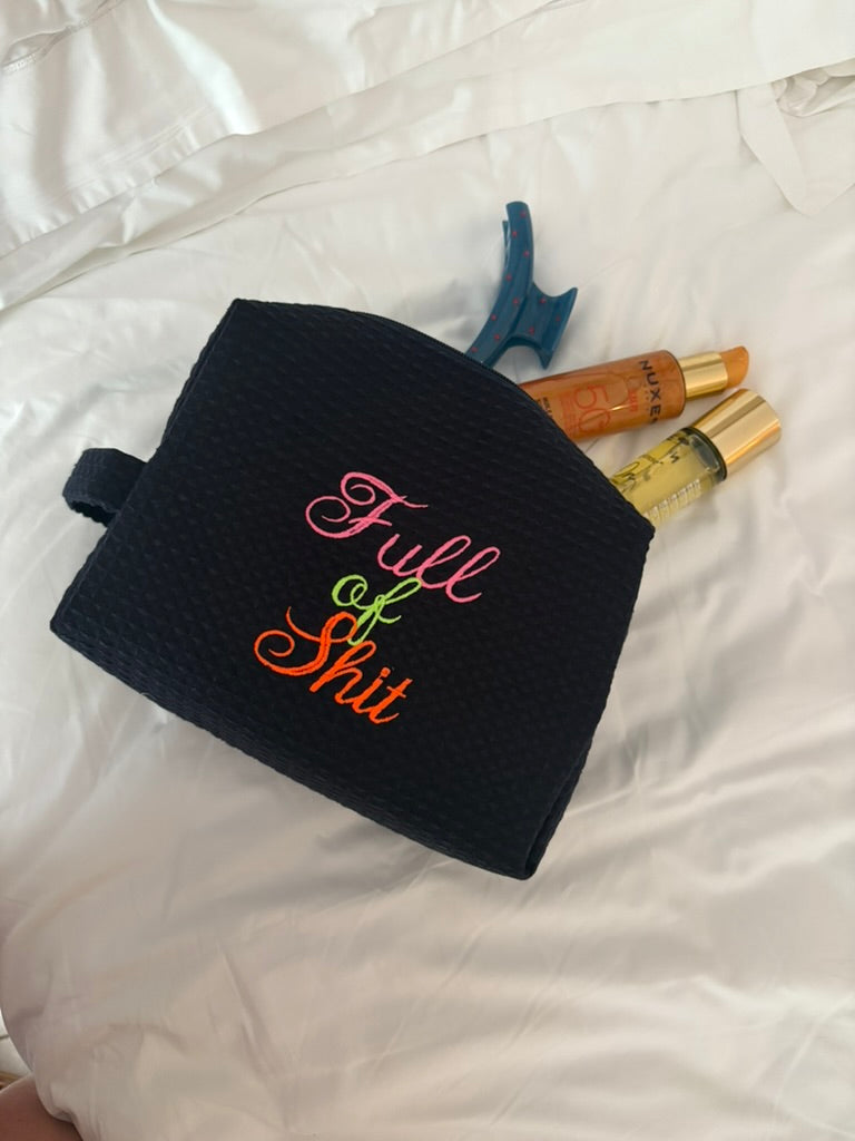 Navy Lillyloves Full Of Shit washbag with bold white text, rectangular shape, and zipper closure for toiletries and travel essentials.