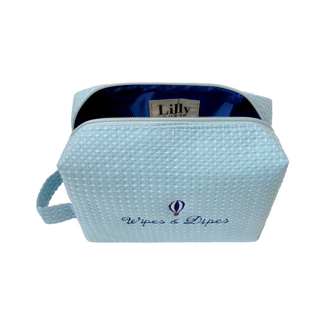 Blue Wipes & Dipes Waffle Bag by Lillyloves, a reusable wash bag with a textured waffle pattern for organizing your essentials.
