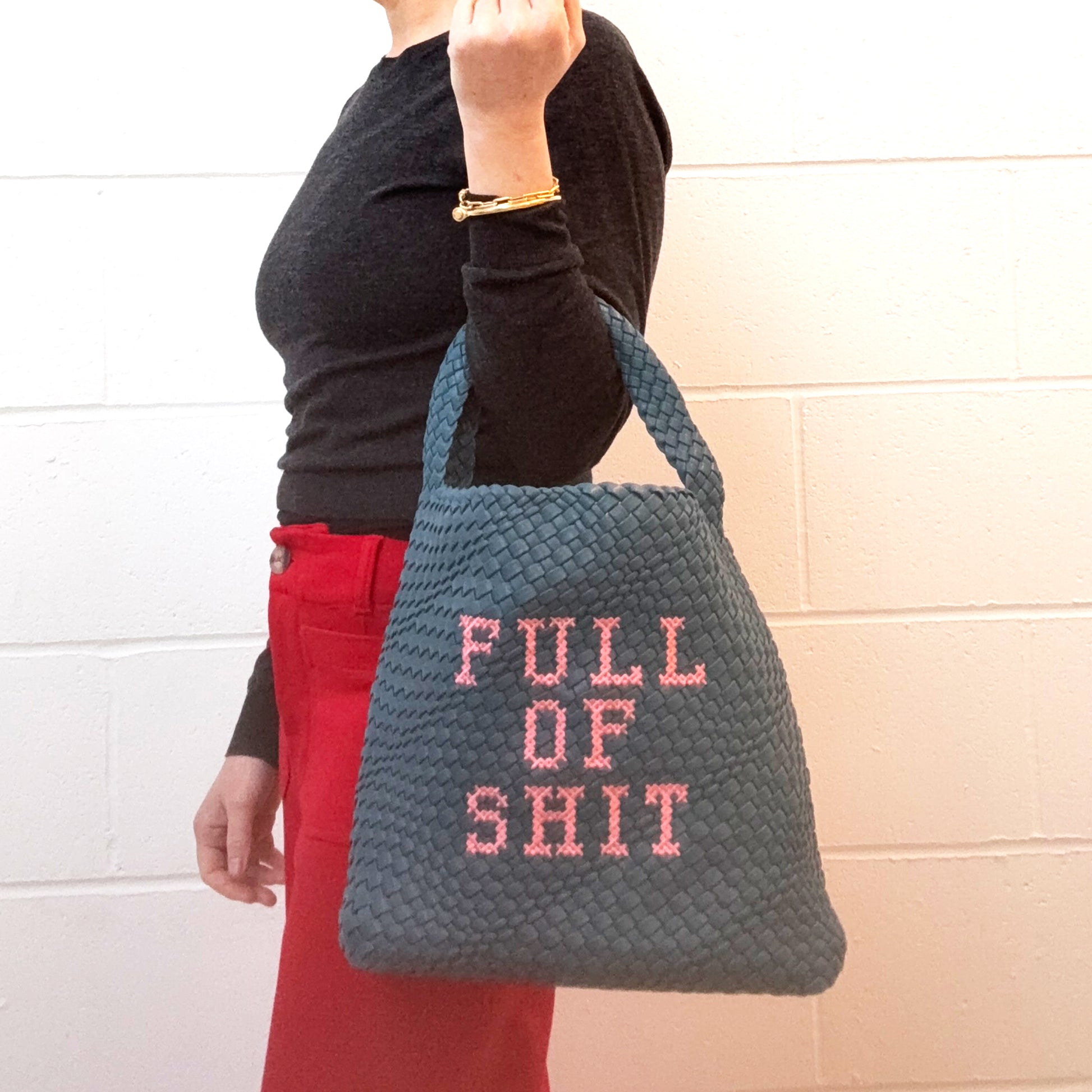 Lilly Loves woven teal shoulder handbag with intricate pattern, featuring a stylish, versatile design perfect for everyday use.