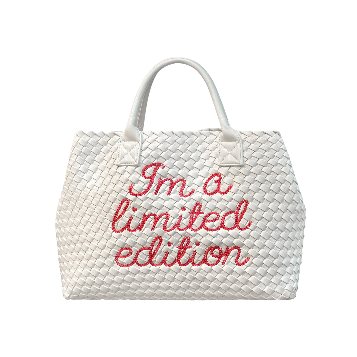 Lilly Loves limited edition white handbag with sleek design, featuring a stylish handle and minimalist aesthetic.