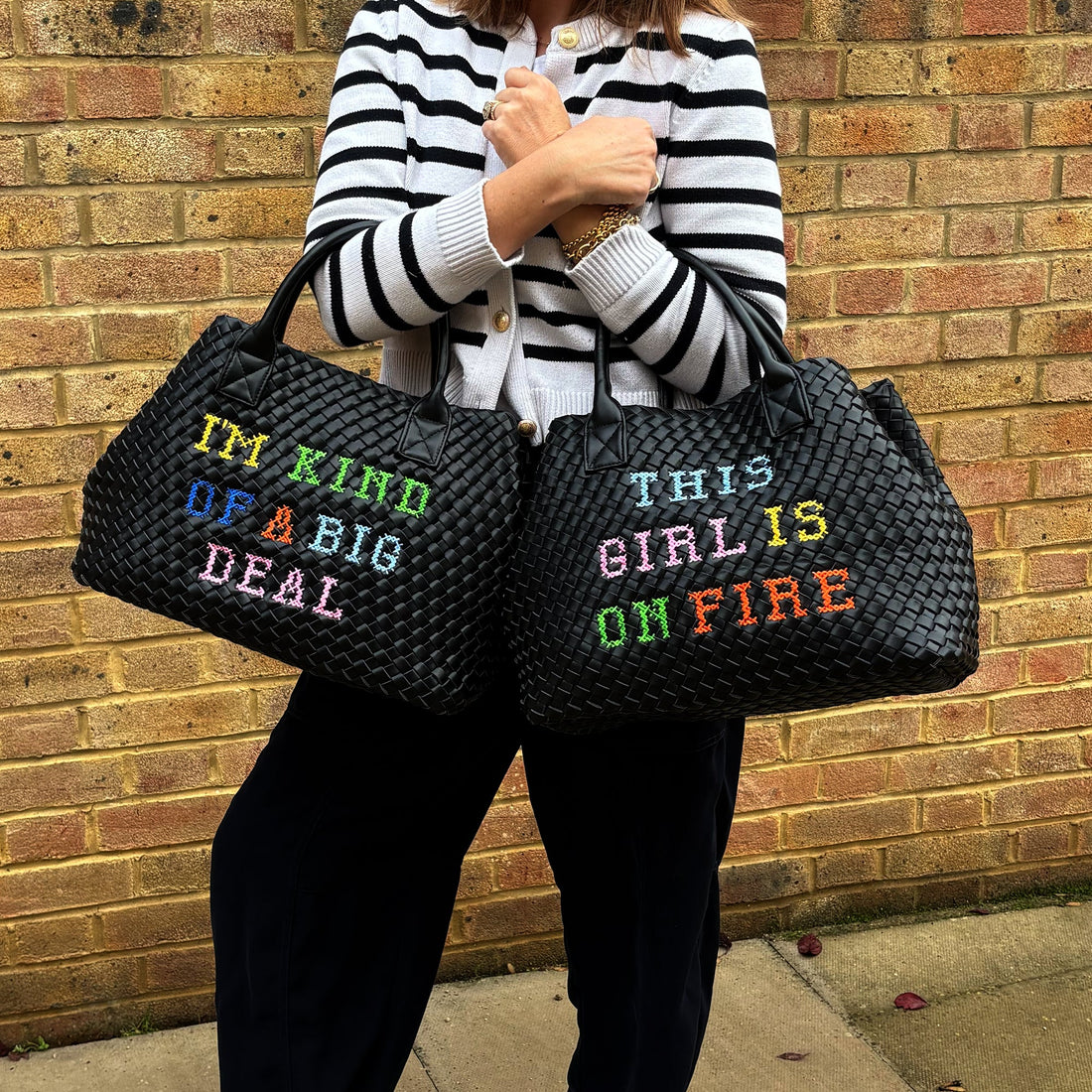 Lilly Loves I'm Kind Of A Big Deal handbag in black with bold white text, featuring a structured design and top handle.