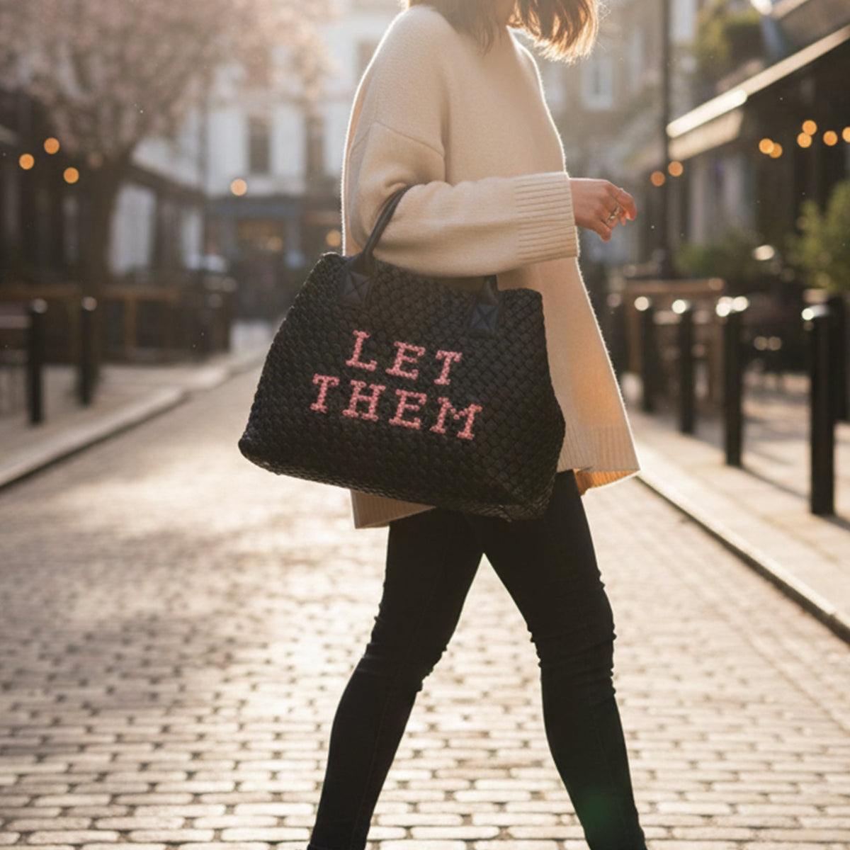Lilly Loves Let Them Vegan handbag in black, stylish vegan leather handbag with silver hardware and top handle, front logo detail.