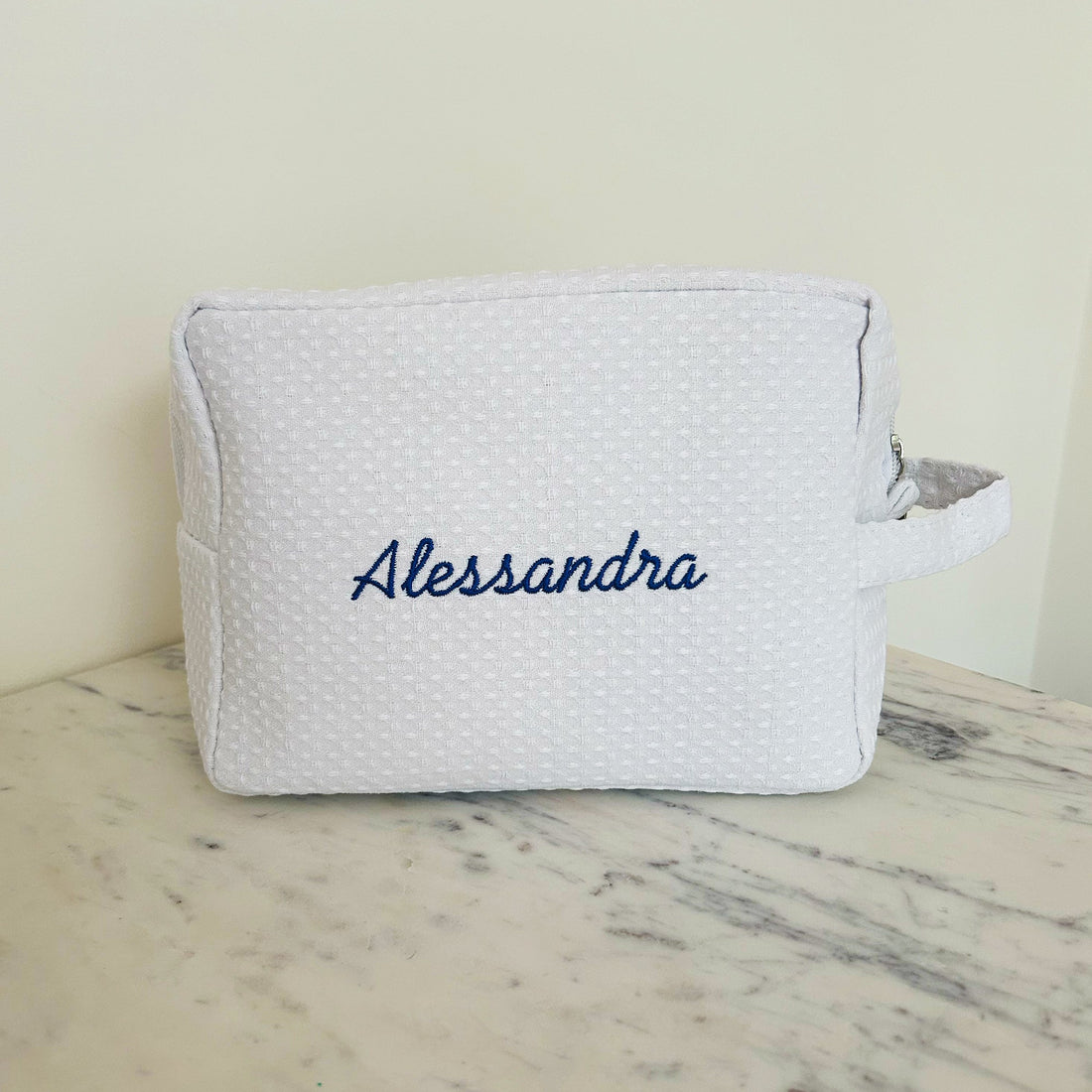 Set of 2 Lilly Loves monogram quilted cosmetic wash bags with elegant design and padded texture, ideal for travel and storage.